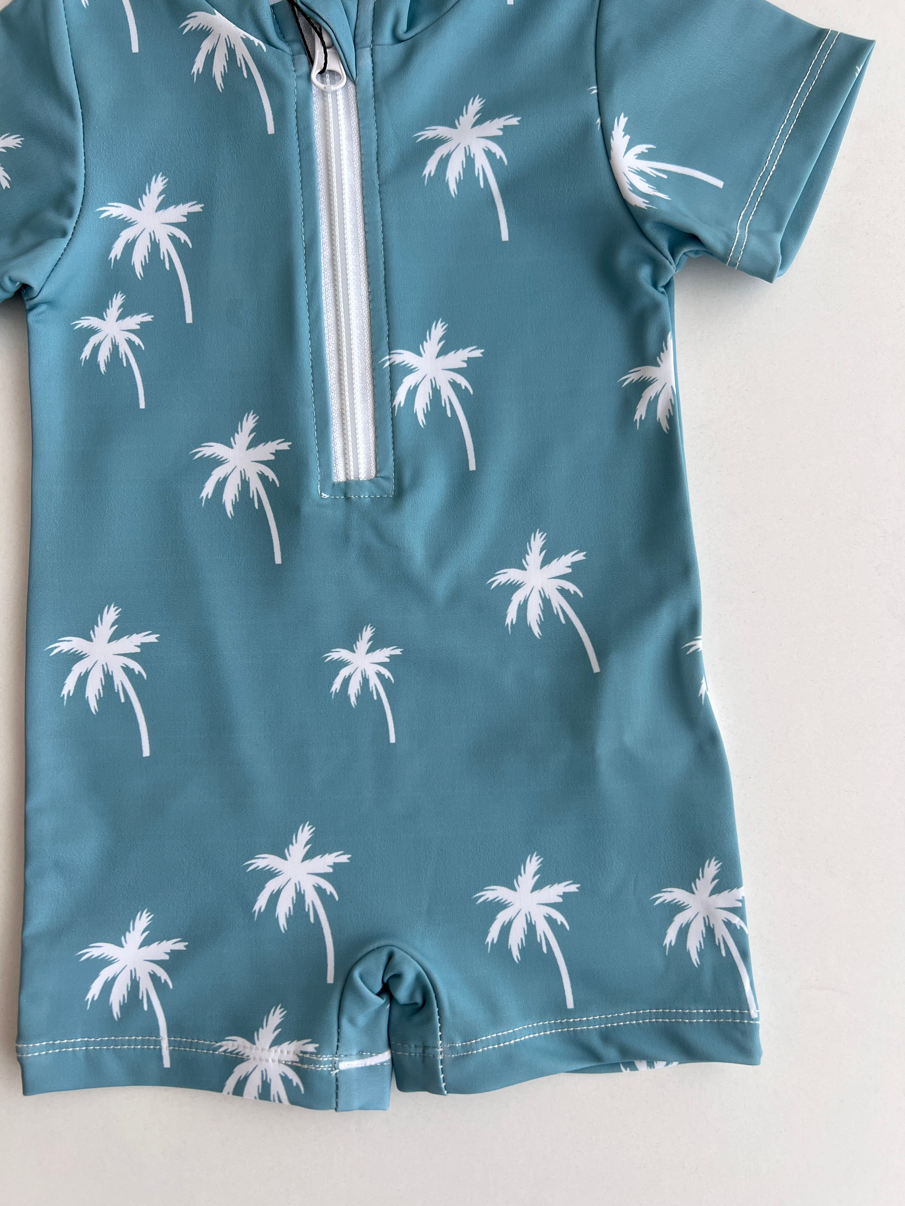 Veshje Plazhi All-in-One – Palma Blu Oqeani